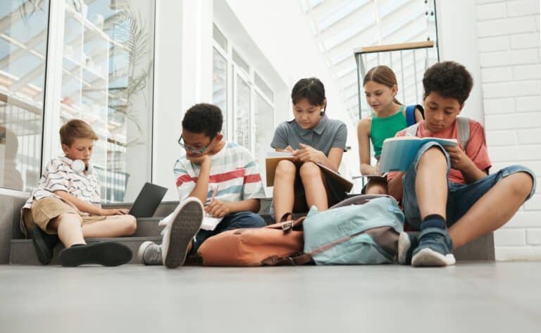 Group of children working on homework together