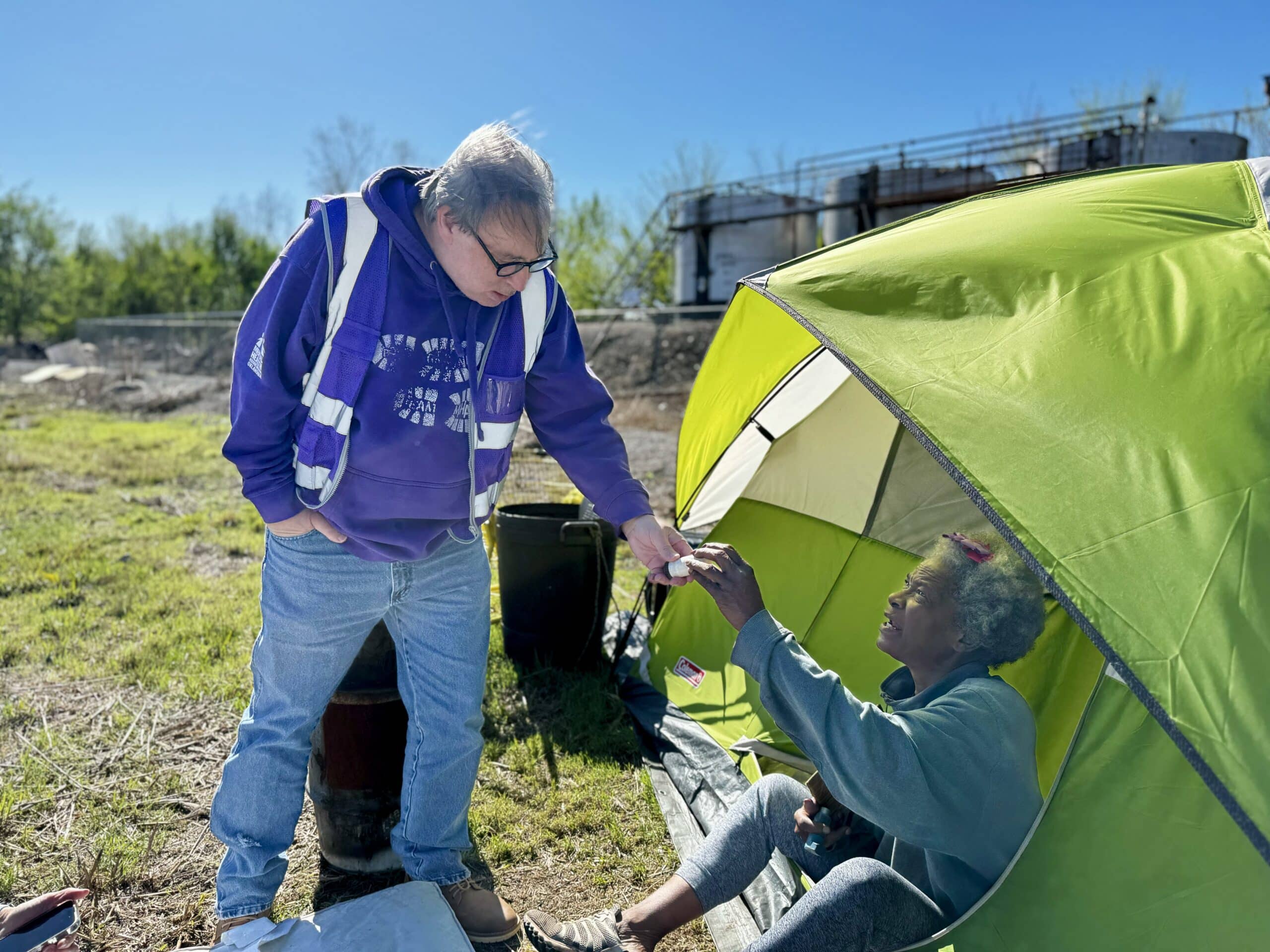 OKC Street Medicine nurse provides assistance to woman experiencing homelessness.